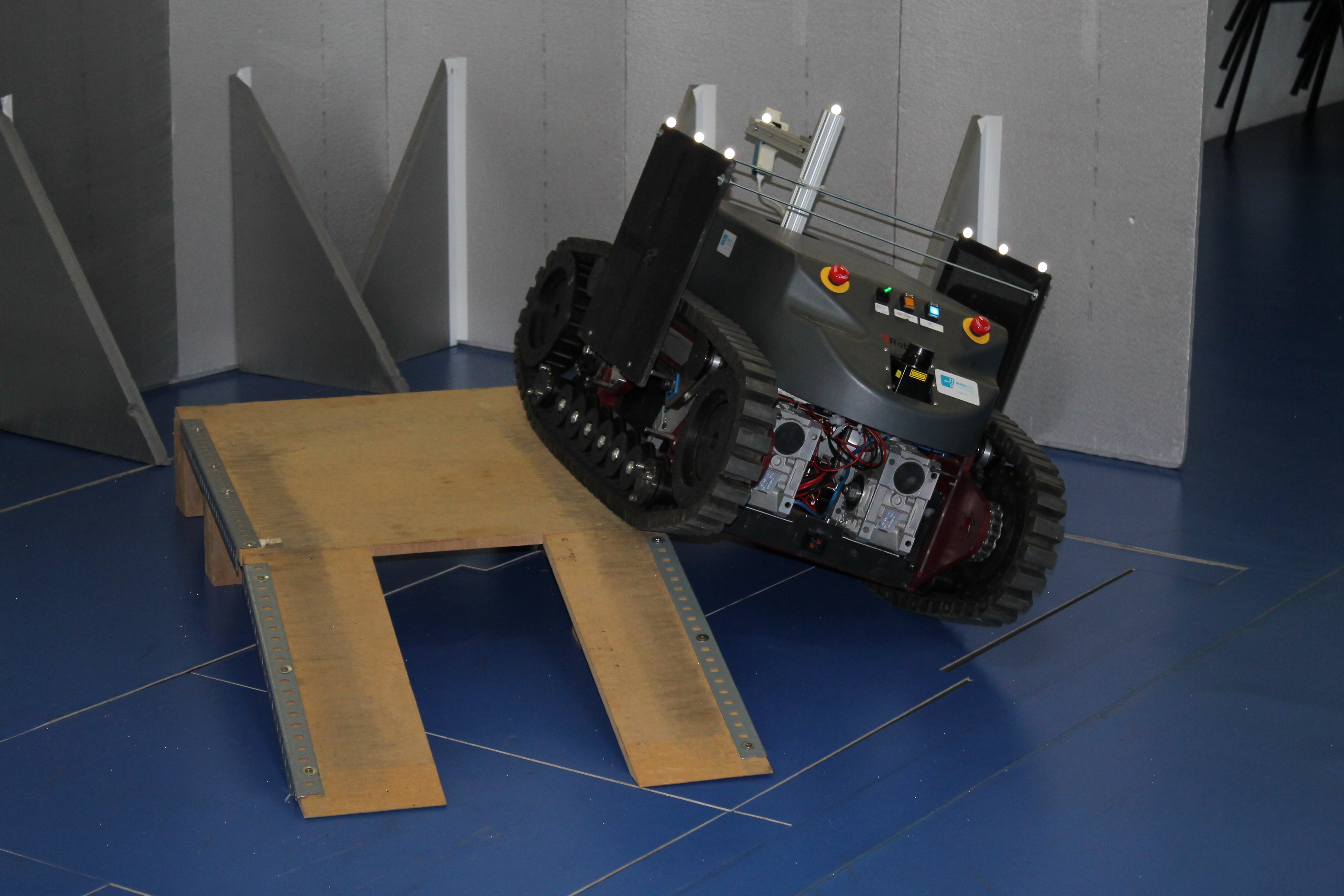 Third testing environment with robot climbing the ramp