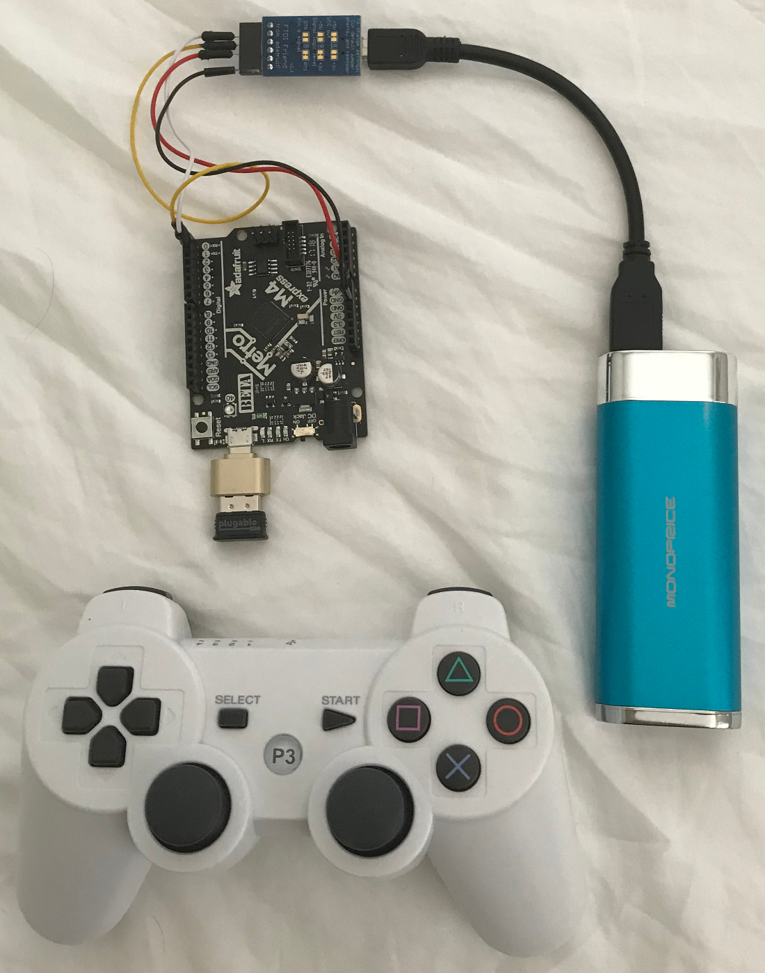 Image of Metro M4 connected to PS3 controller clone via Bluetooth