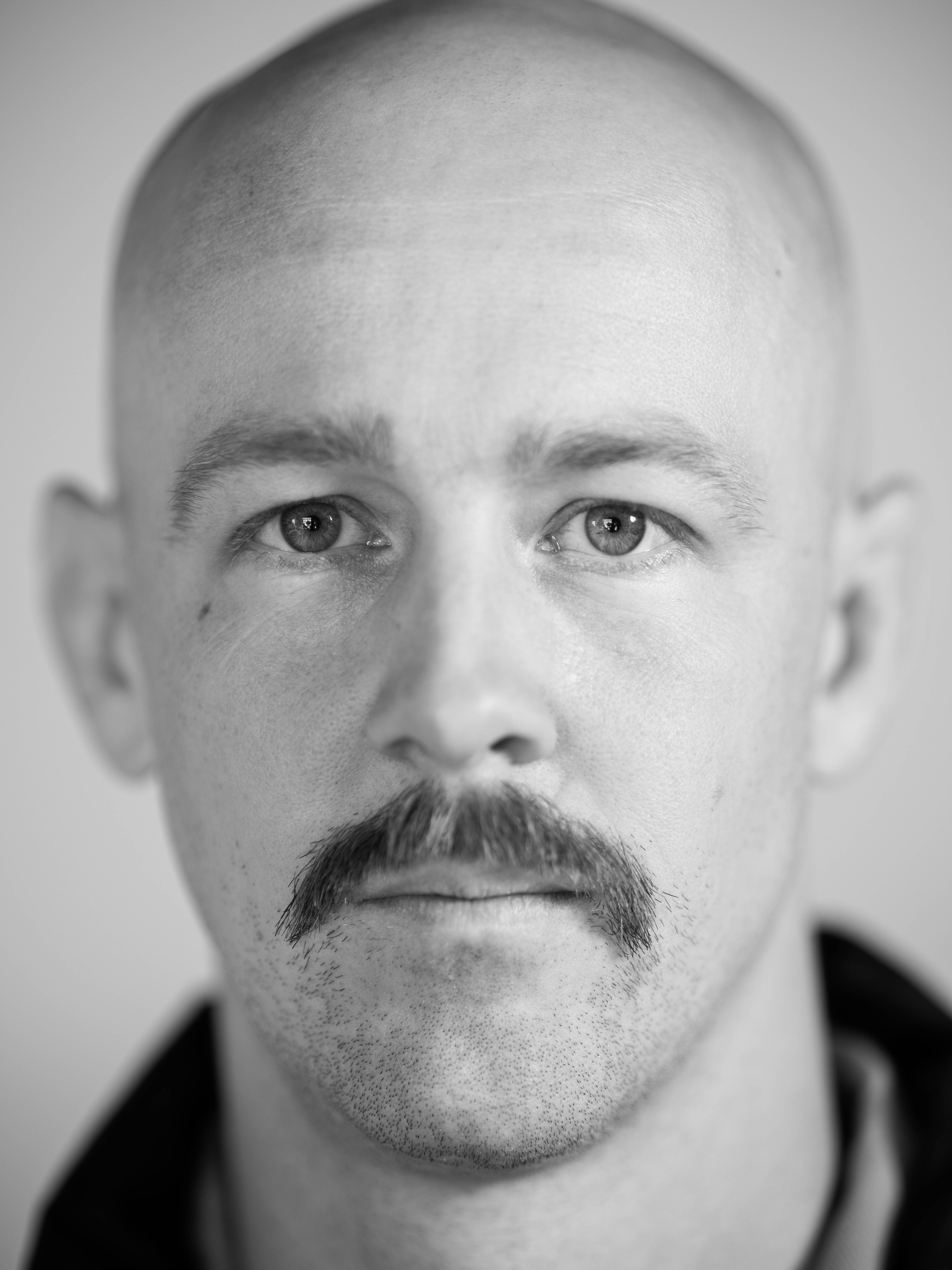 Black and white portrait of Zachary Craig Hanson