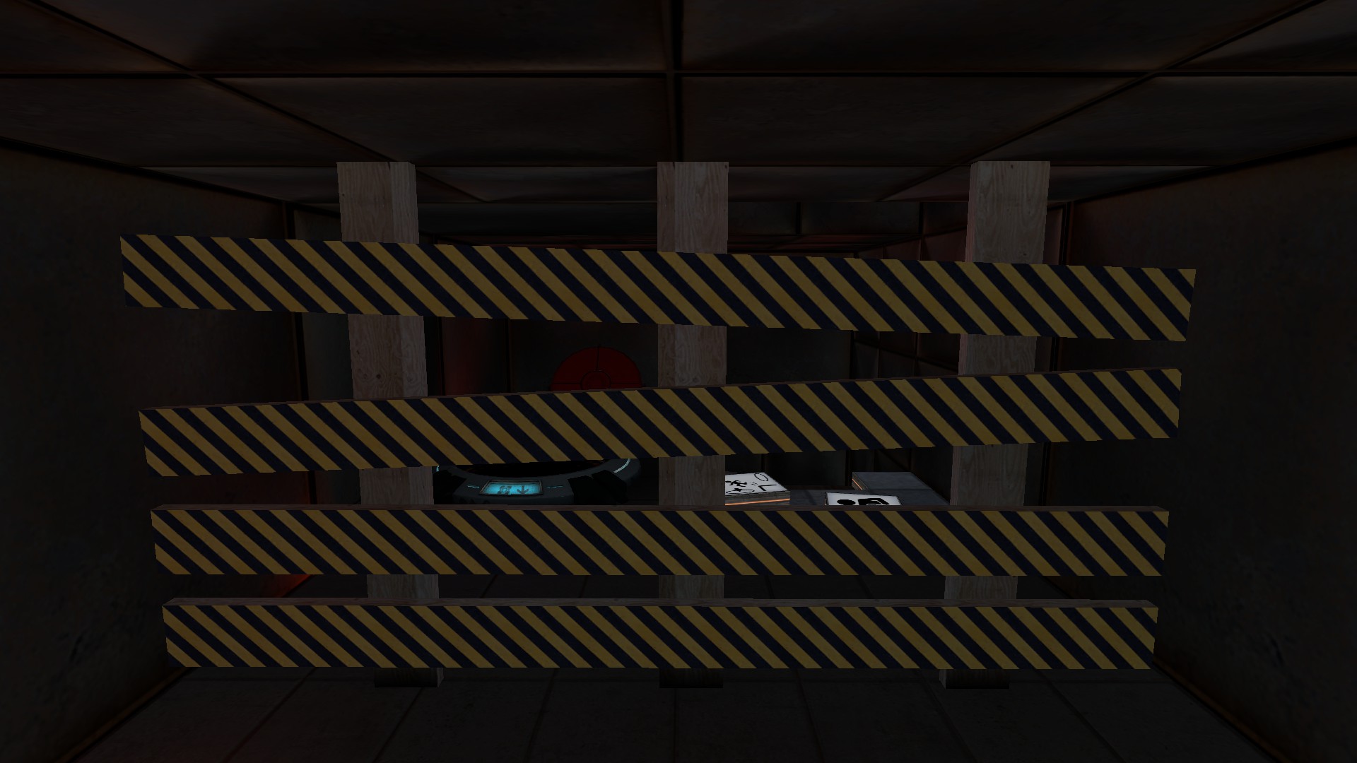 A test chamber under construction is blocked off by a caution barrier.