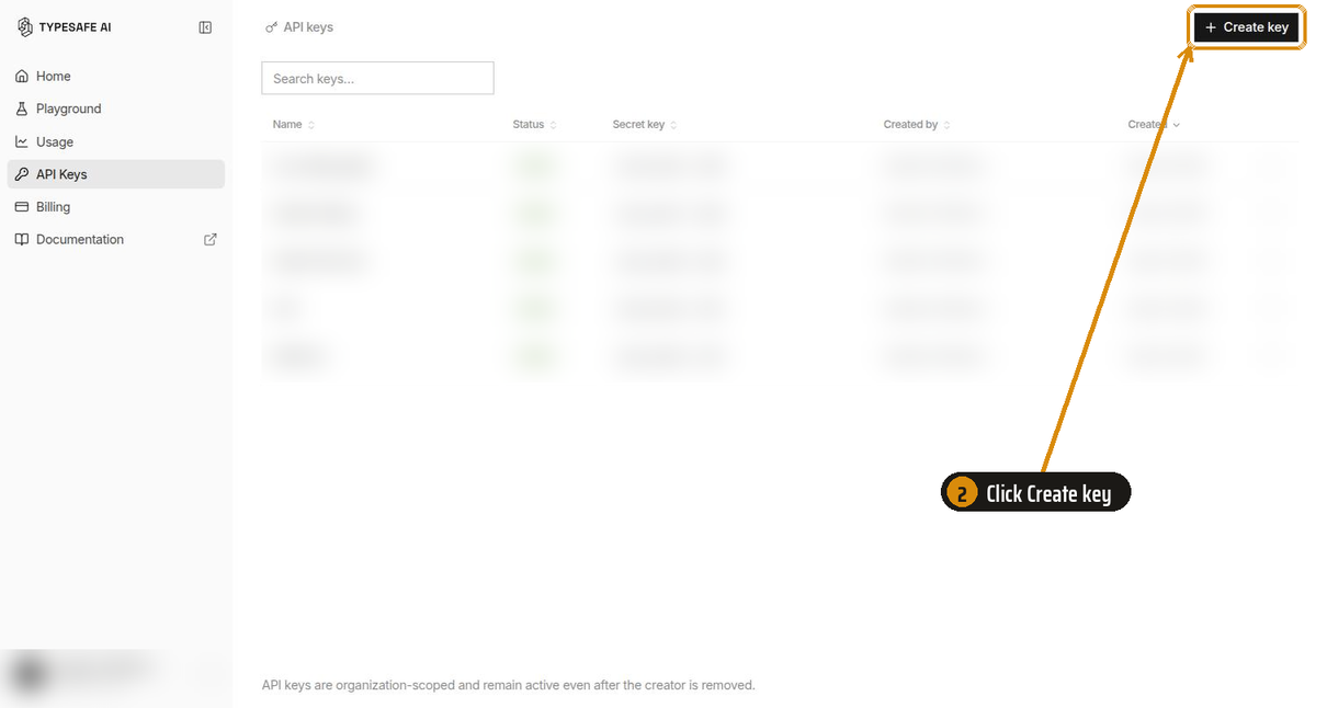 The API keys page. Existing keys are blurred. An amber box and arrow point at the Create key button at the top right.