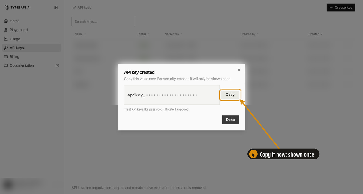 The API key created dialog. The key value is masked. An amber box and arrow point at the Copy button.