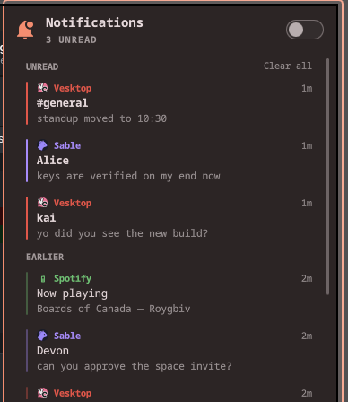 The notification center open in the bar, showing unread and earlier notifications from Vesktop, Sable, and Spotify