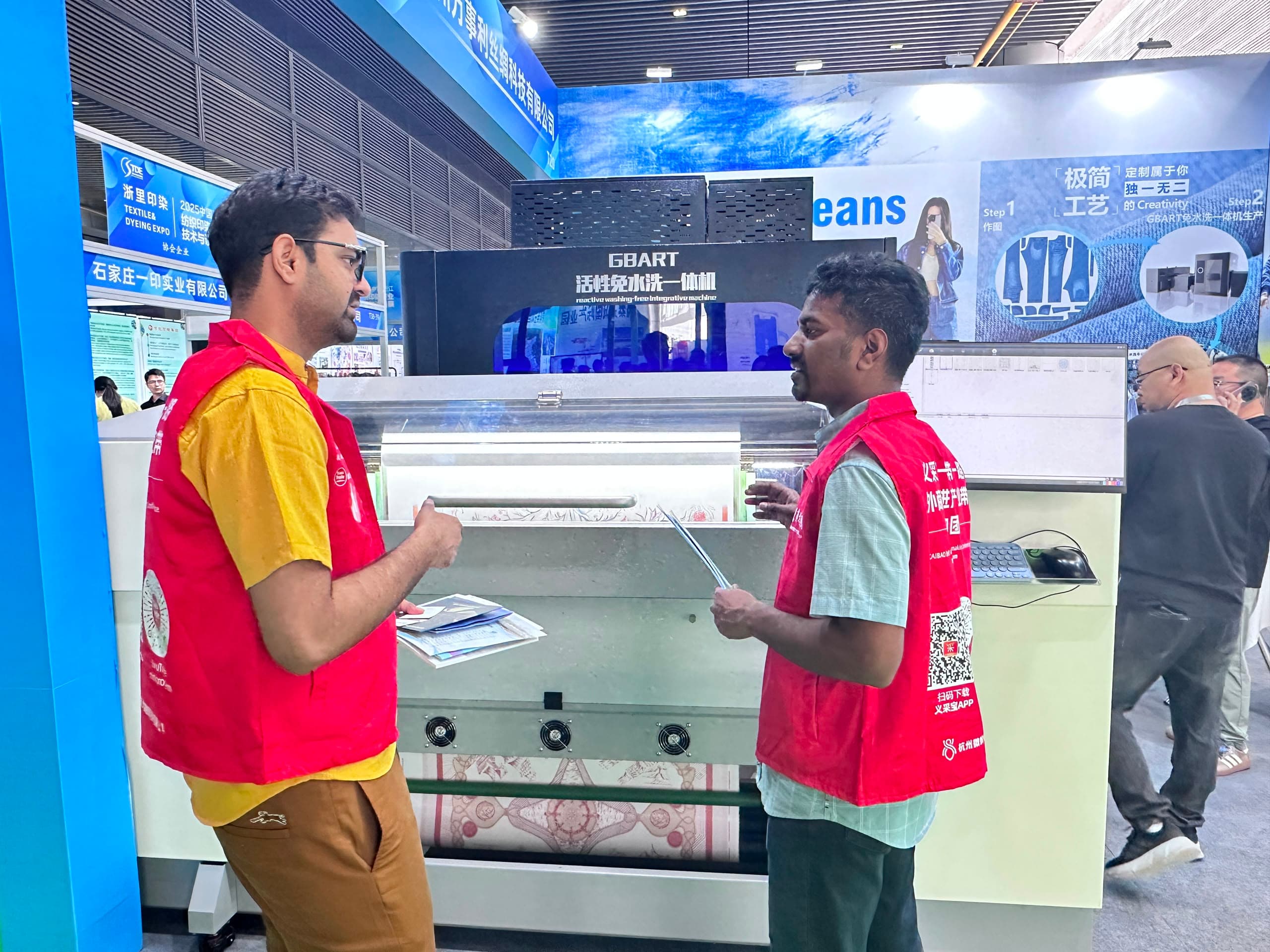Shaikh China Sourcing team inspecting machinery at a trade exhibition in China