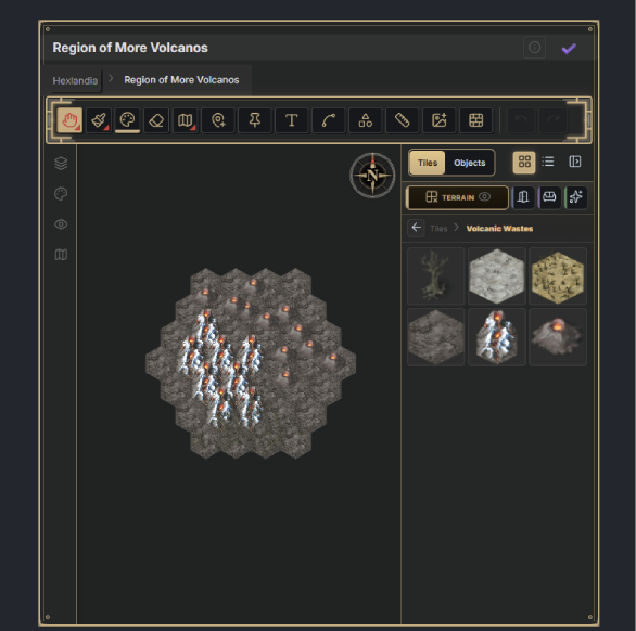A nested sub-map, "Region of More Volcanos", opened from a hex on the world map — breadcrumbs above the tool palette, terrain strata selected, and volcanic tiles painted from the tile drawer