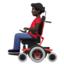 man_in_motorized_wheelchair