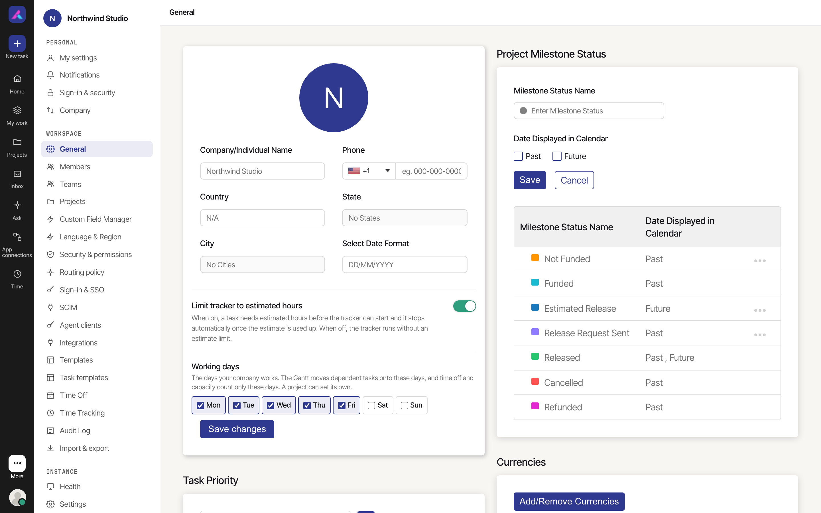 Workspace General settings with company details, working days, the tracker limit and project milestone statuses