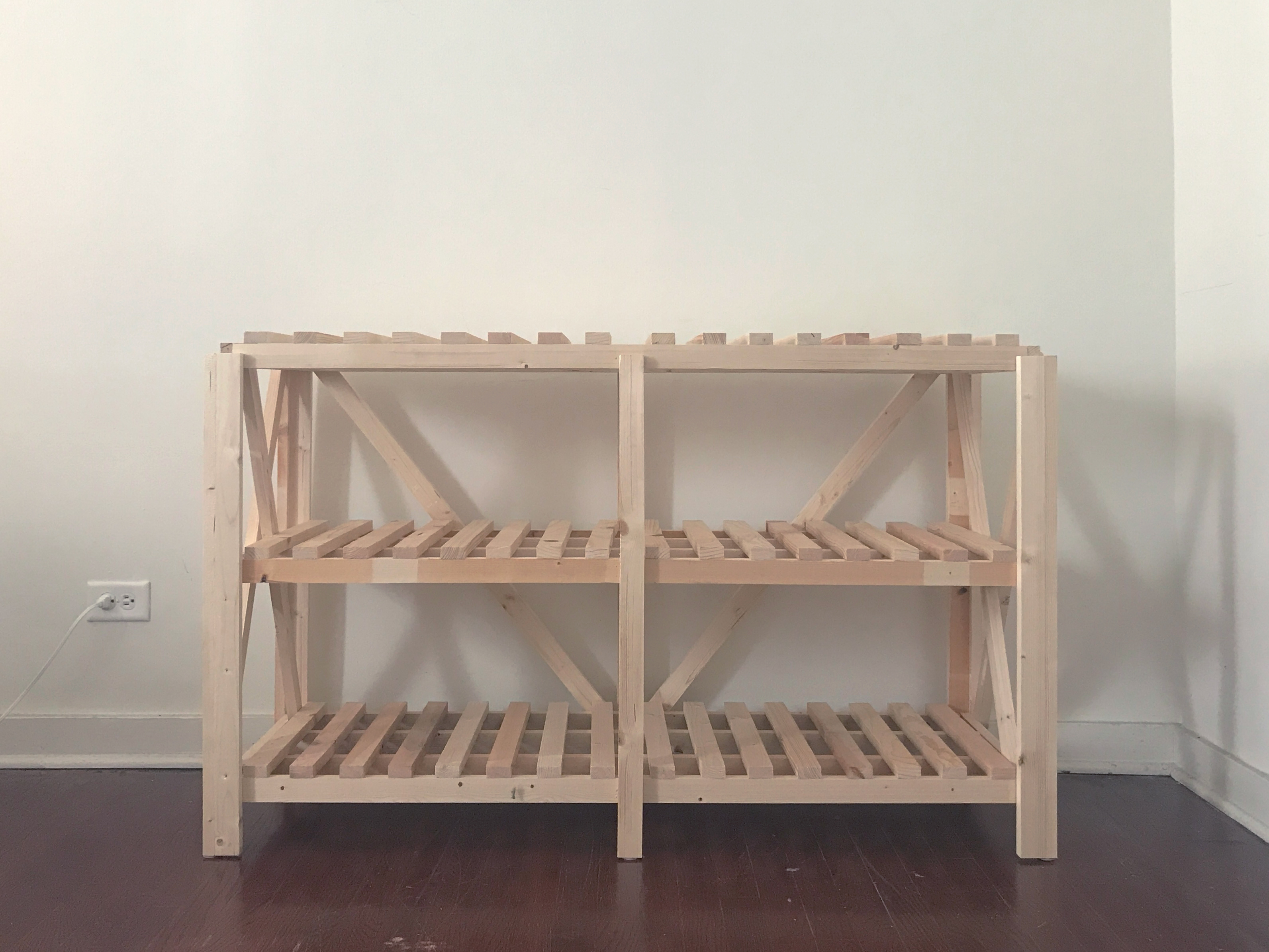 photo of an empy wooden standing shelf