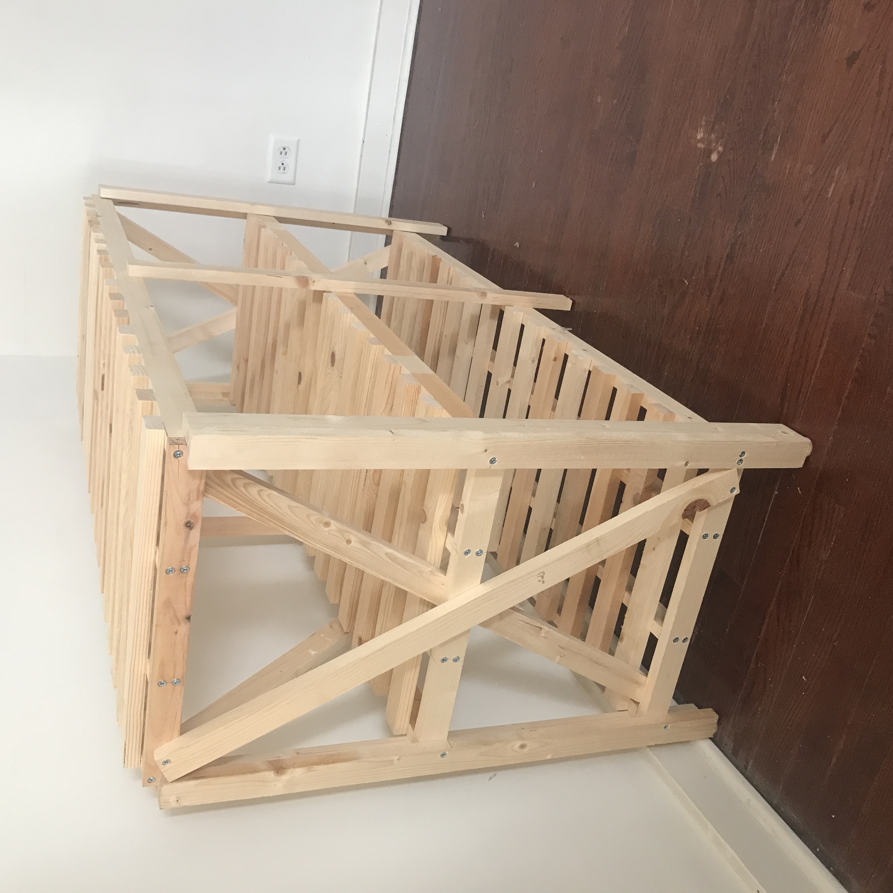 photo of an empy wooden standing shelf