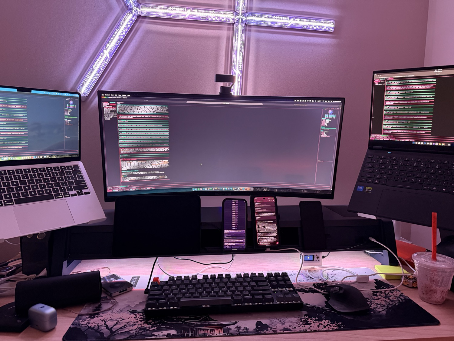 blumi running at once across a MacBook Air, a MacBook Pro, a Linux laptop, and a foldable phone