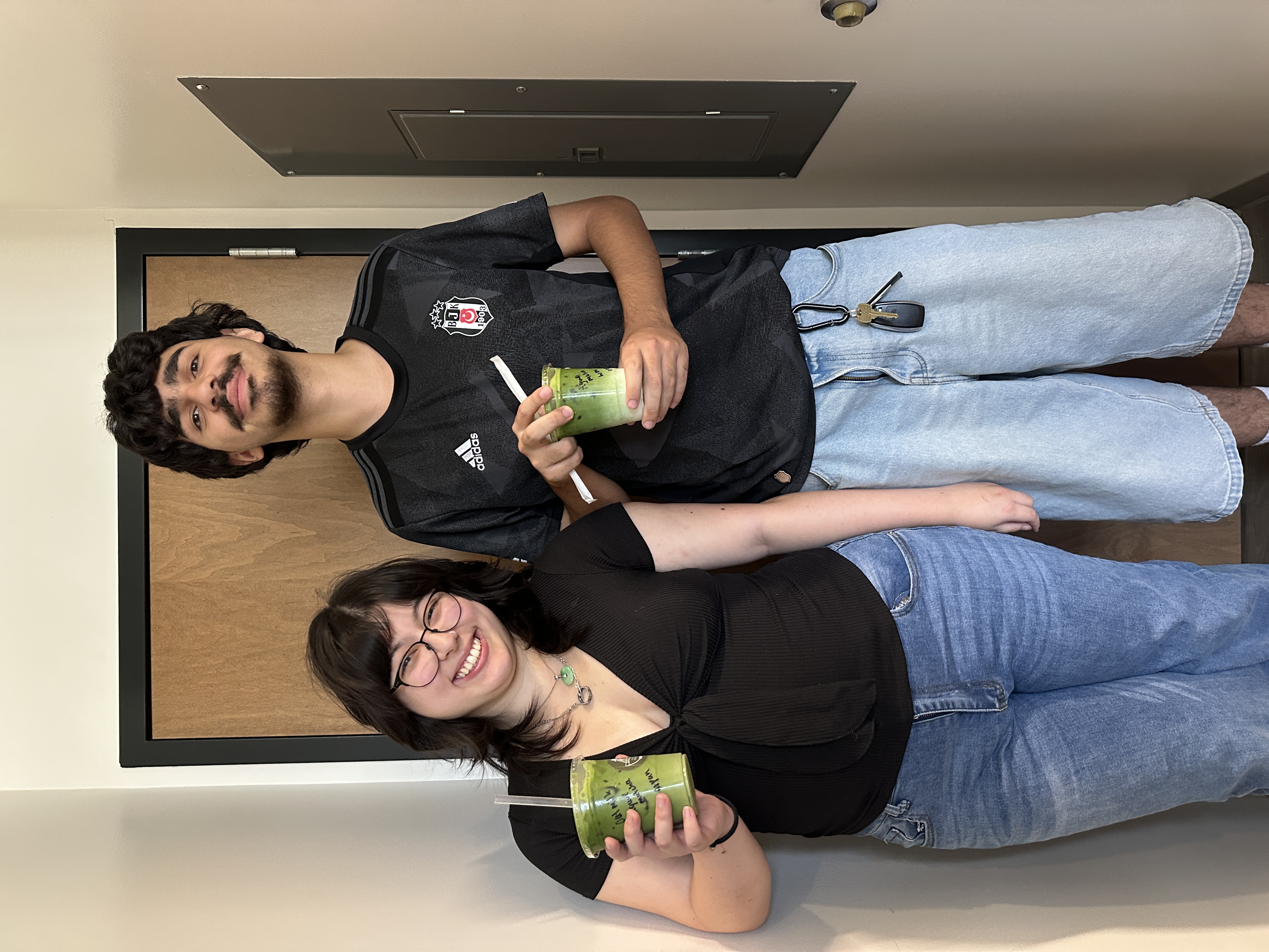 Customer holding matcha cup
