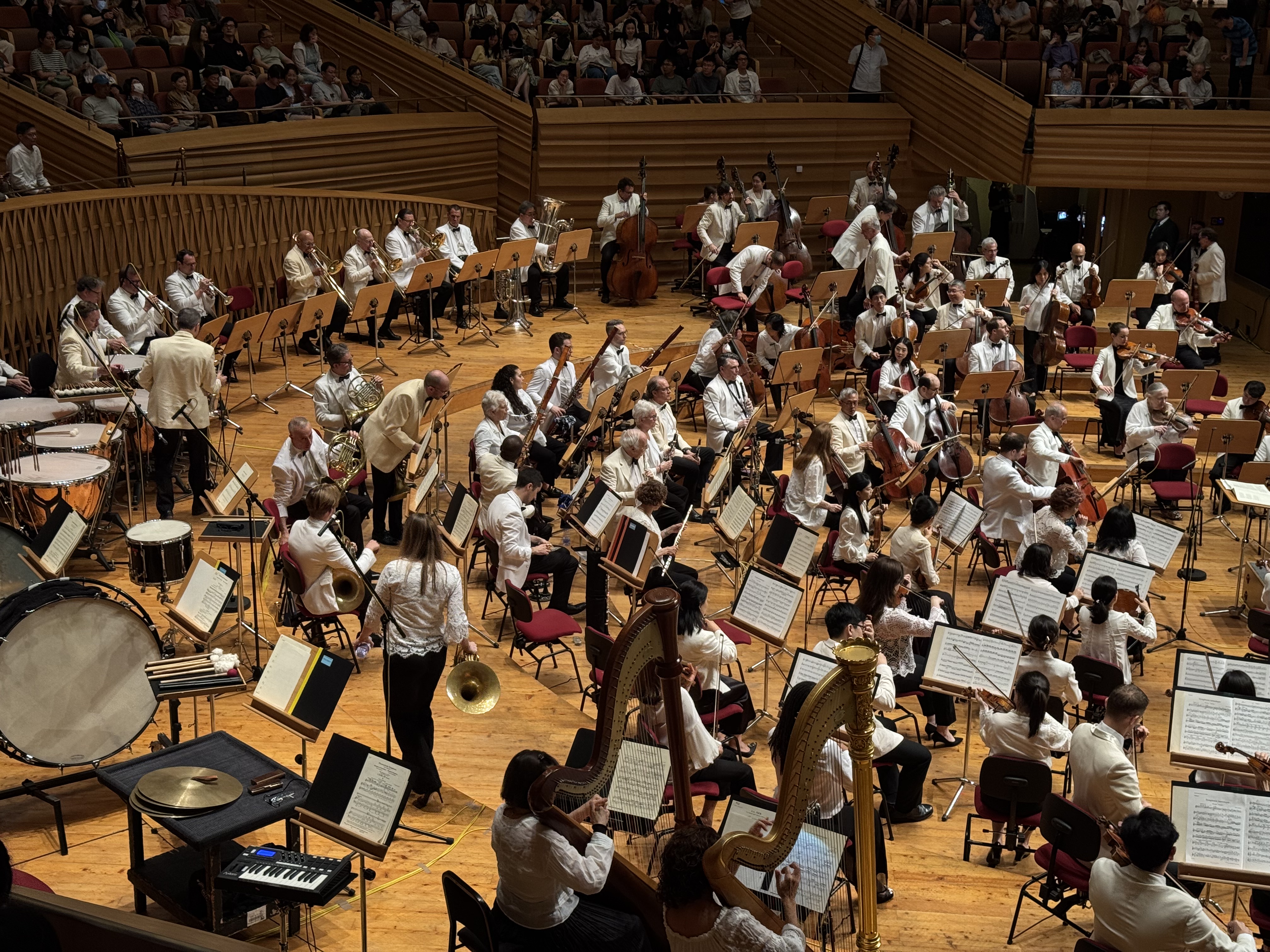 Debussy and Belioz piece requires a lot of brass — and they maintained a safe distance for the woodwind pals.