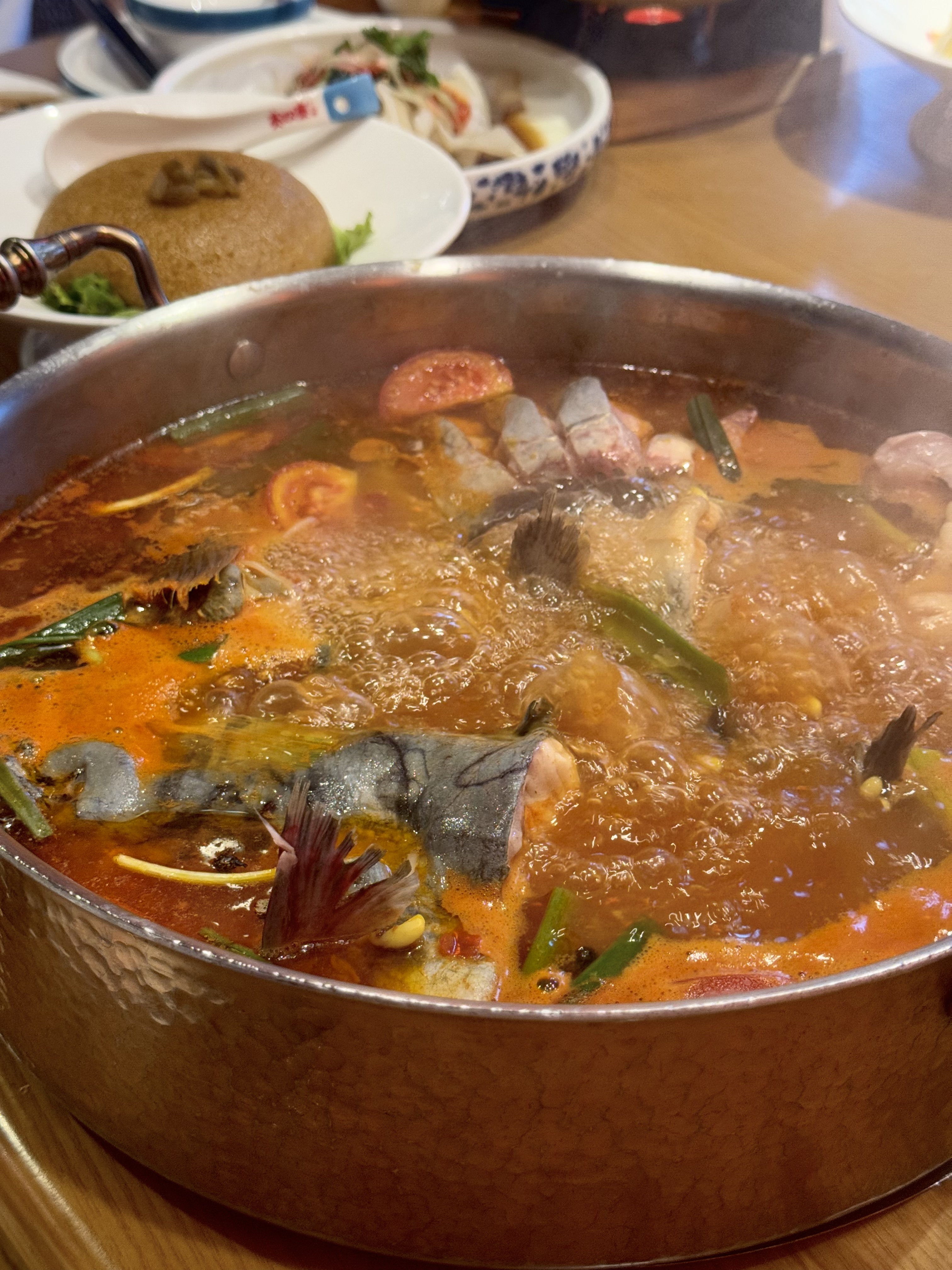 To those used to treating fresh fish with the gentlest touch, this feels like heresy — yet the tangy, chili-spiked soup makes it unforgettable.