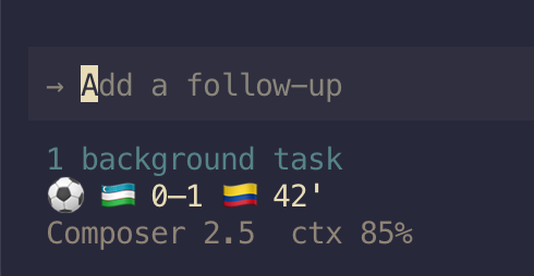 A live World Cup score in a Cursor CLI statusline — Uzbekistan 0–1 Colombia, 42' — with a model and context line below it