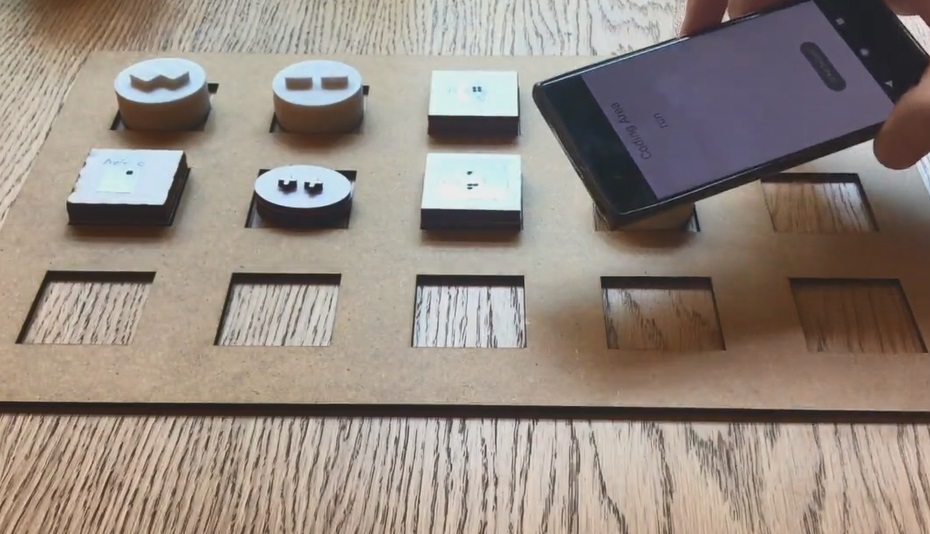tangible music blocks on a rack and companion Android app