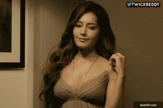 Raashi Khanna Playfully Adjusts Her Hair With a Charming Smile