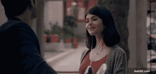 Sanjana Sanghi Smiles Warmly While Listening to Music