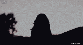 Ritika Badiani Stands Silhouetted Against a Beautiful Sunset