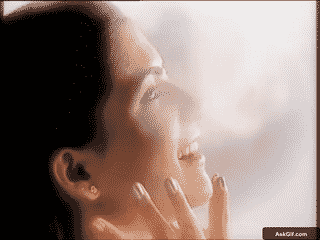 Kashmira Shah Smiles Radiantly While Touching Her Face