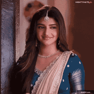 Sreeleela Smiles Radiantly While Standing at the Doorway