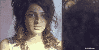 Parvathy Thiruvothu Looks Thoughtfully in the Mirror, Deep in Reflection