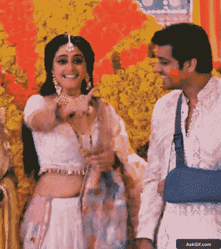 Vishakha Singh Playfully Points and Smiles During a Festive Celebration