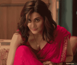 Tapsee Pannu Playfully Adjusts Her Hair While Smiling Charmingly