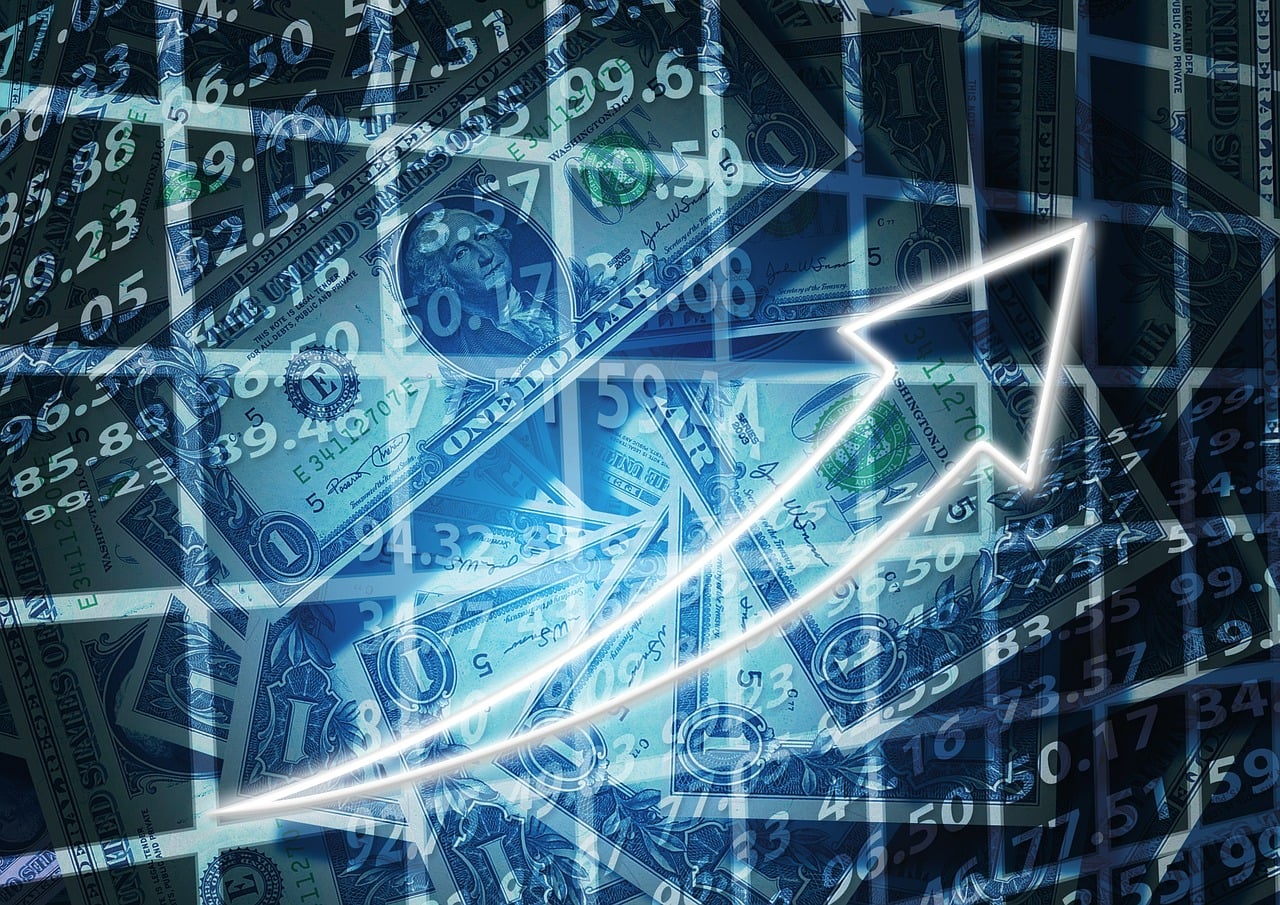 Dividend stocks concept showing stock charts and dividend payments