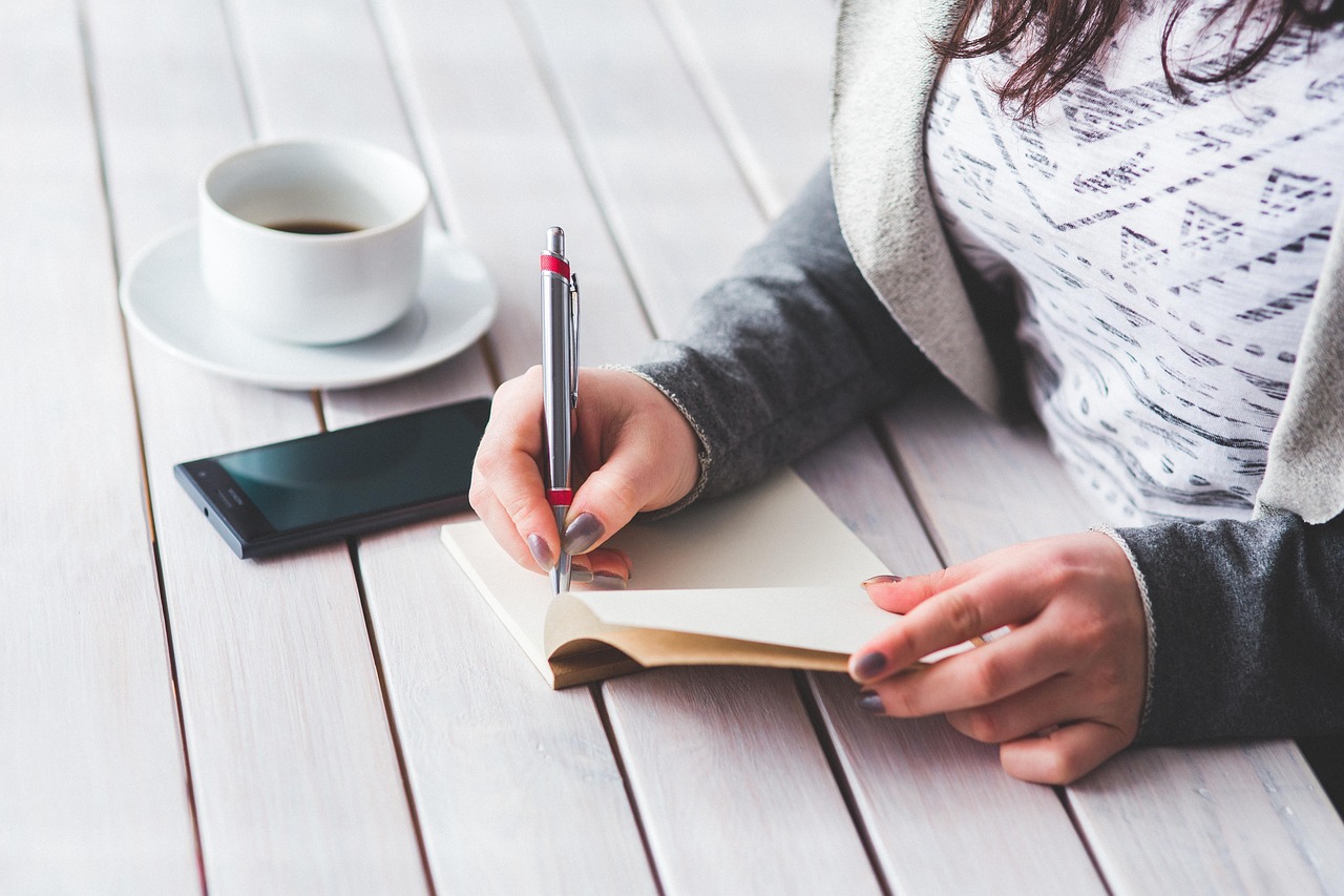 Work from home concept showing laptop and coffee