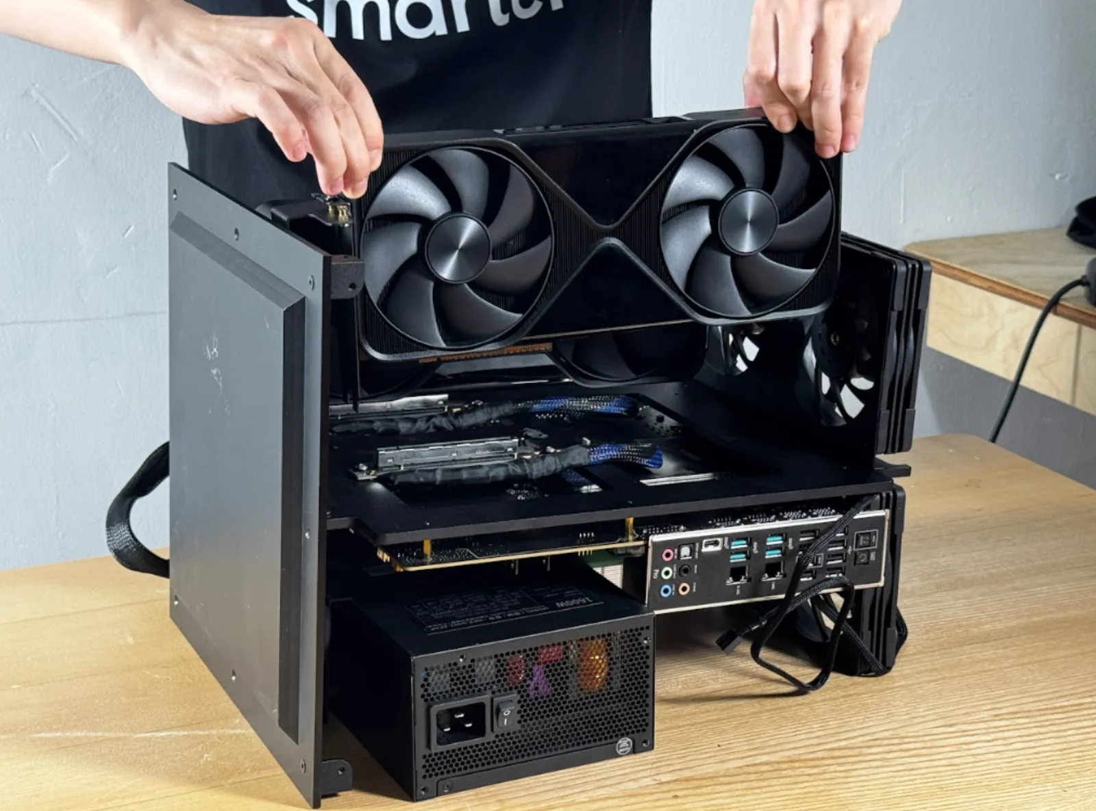 Lowering the second card onto the riser