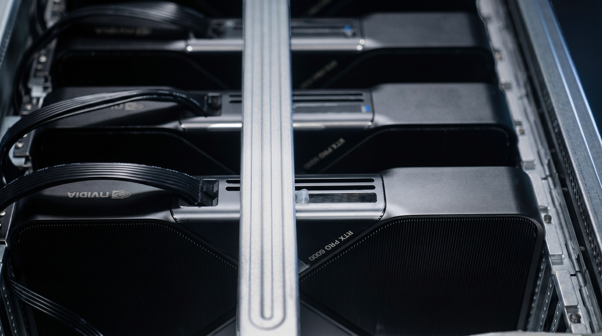 An RTX PRO 6000 Blackwell Workstation card — flow-through cooler, 'RTX PRO 6000' shroud
