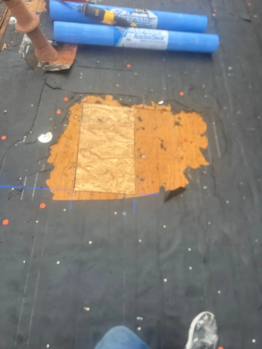 Exposed roof decking documented with new underlayment patch