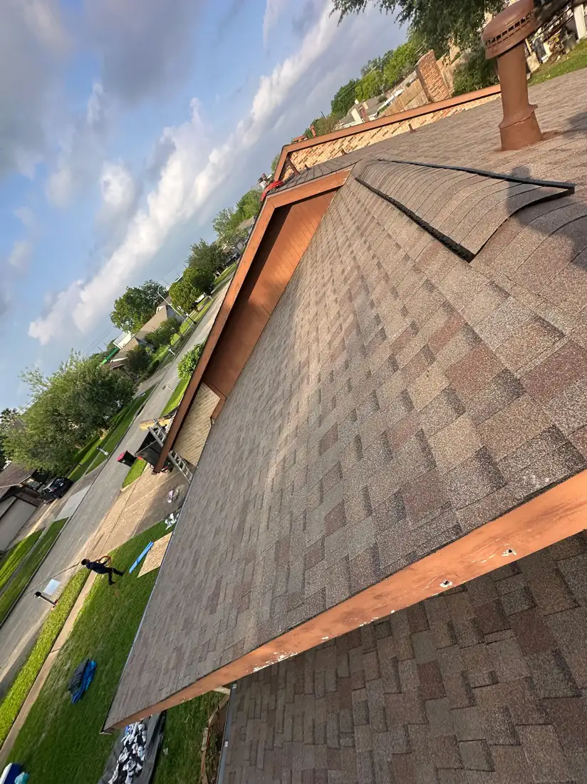 New metal flashing line along a residential roof edge