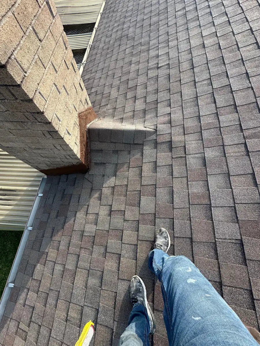 New metal flashing installed on a residential roof in Houston after storm repair