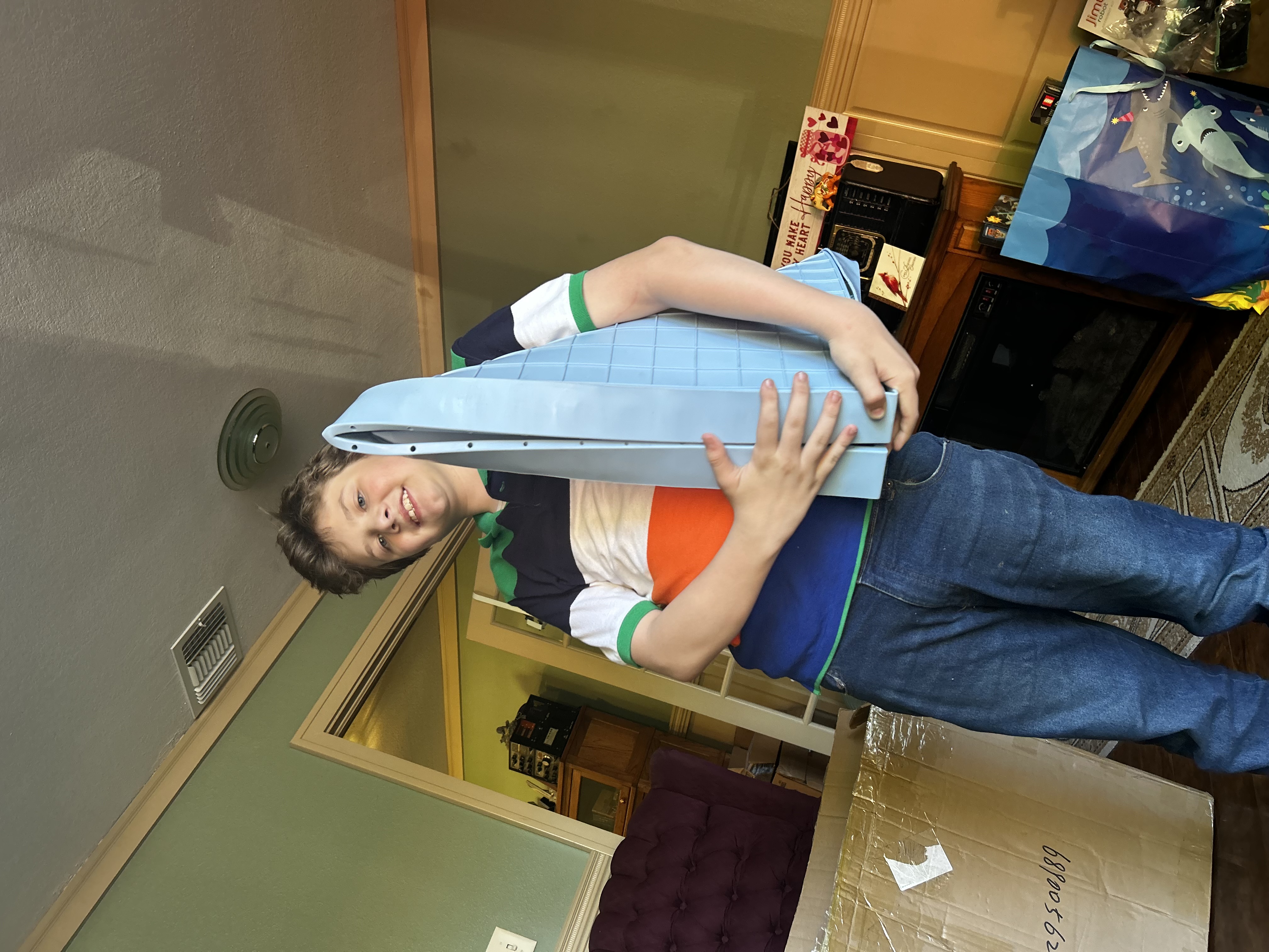 Universal Wonder Mat demonstrating its flexible shape and versatility.