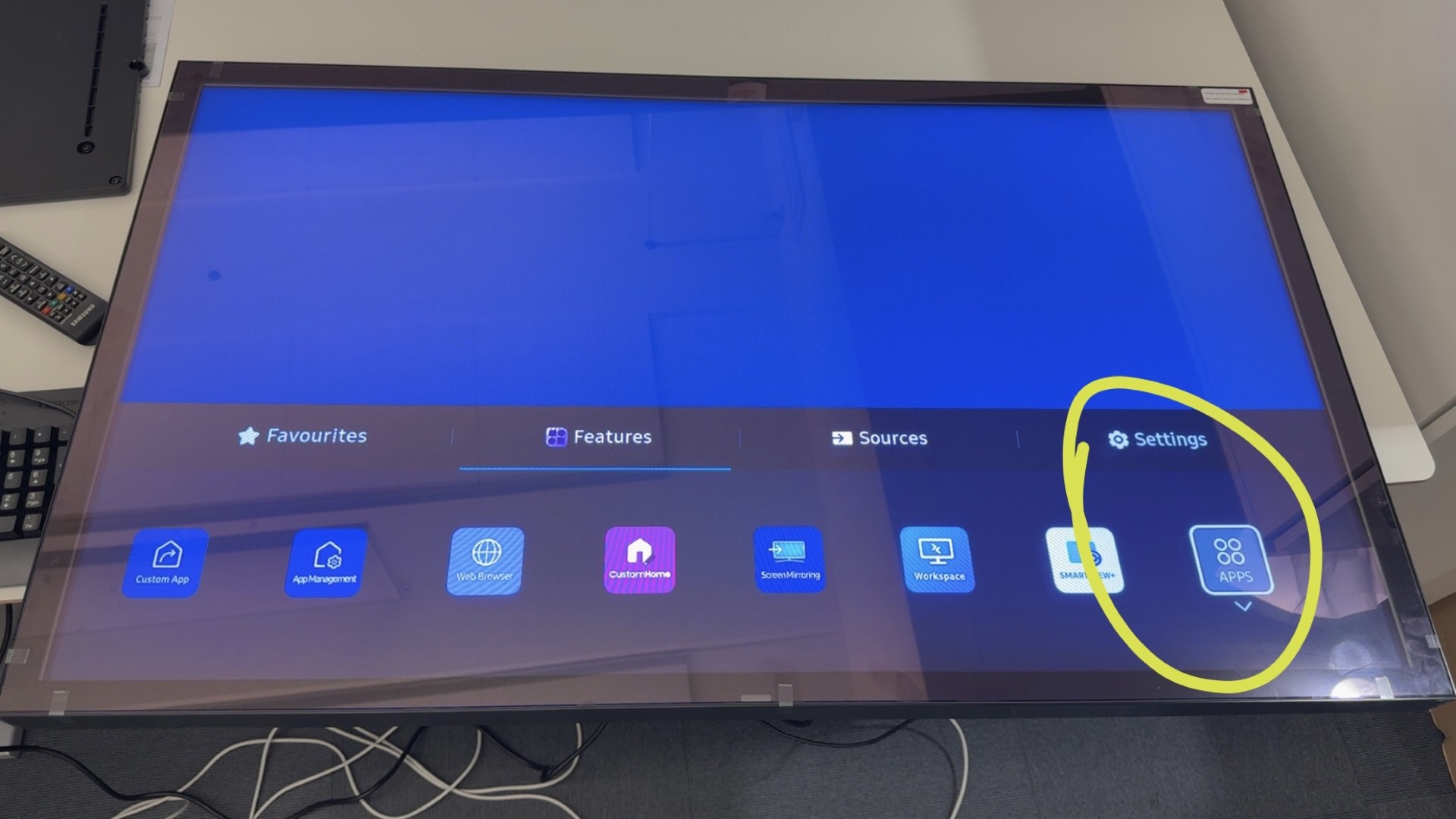 OH46DX Home screen — Apps is the rightmost icon under Features