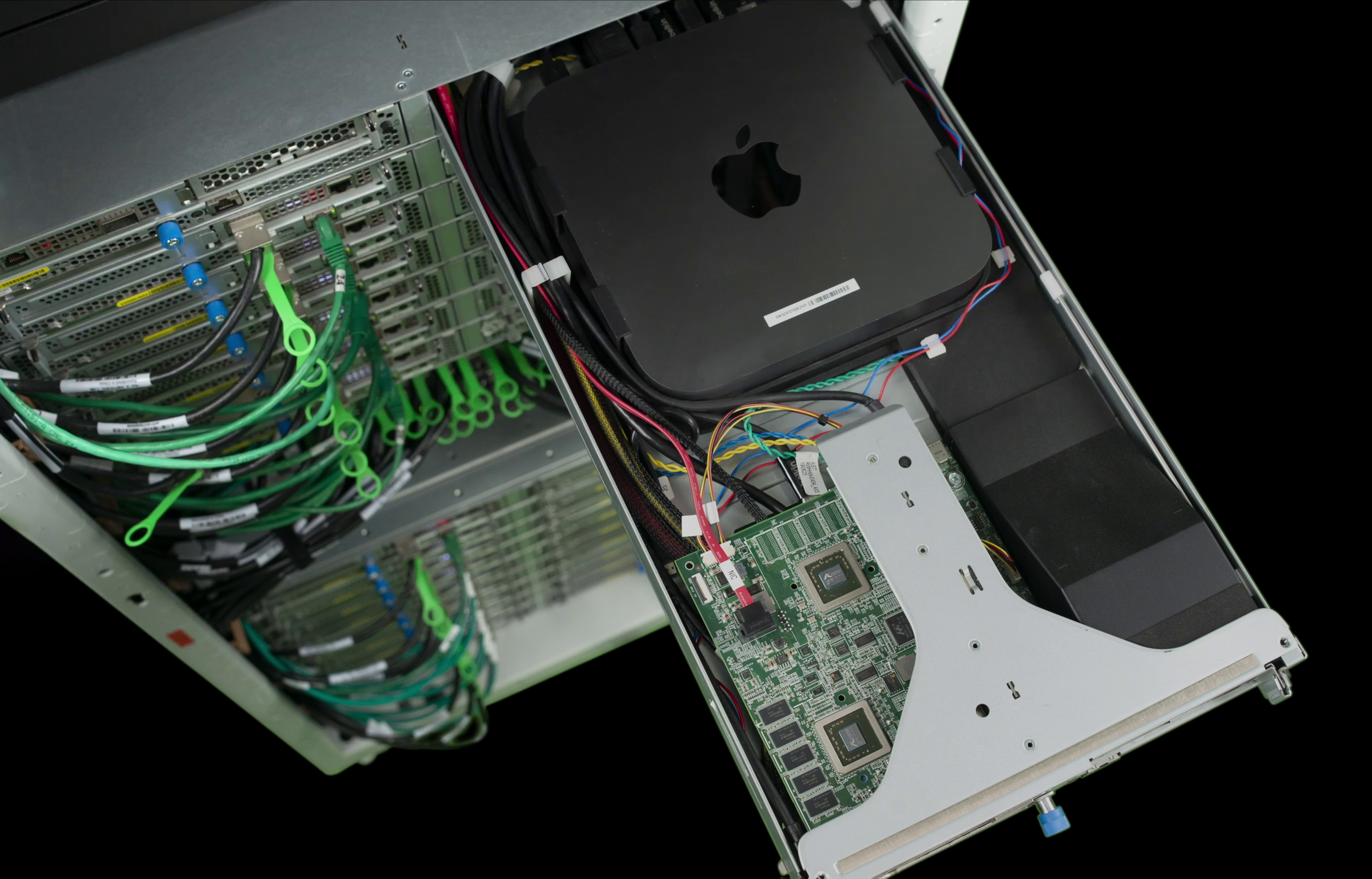 A Mac Mini inside a rack sled, connected to the AWS Nitro System via Thunderbolt 3