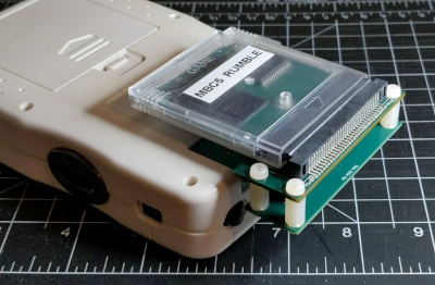 MegaDuck Adapter plugged into a Mega Duck console with a game boy cart connected