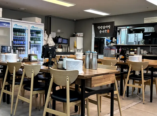 Clean dining hall and open kitchen