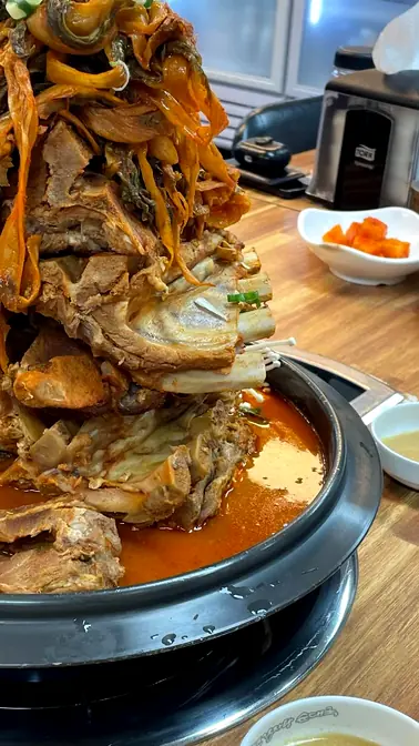 Stacked pork back ribs in pot