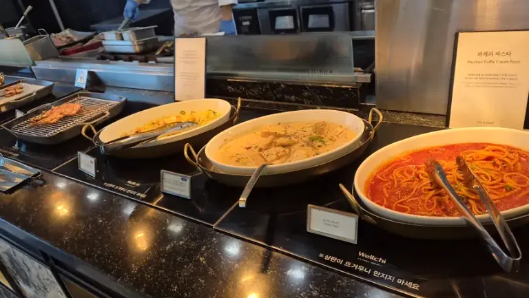 Assorted pasta station at hotel buffet
