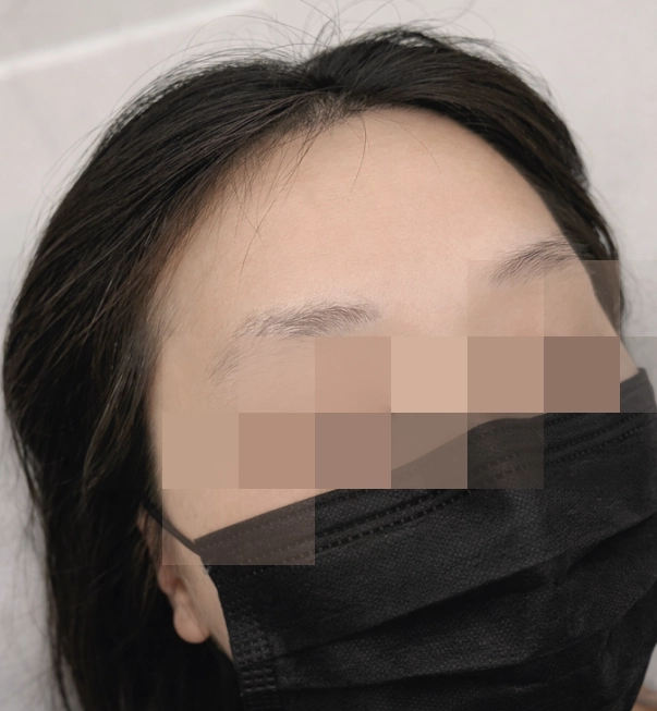 眉スタイリング後の男性顧客