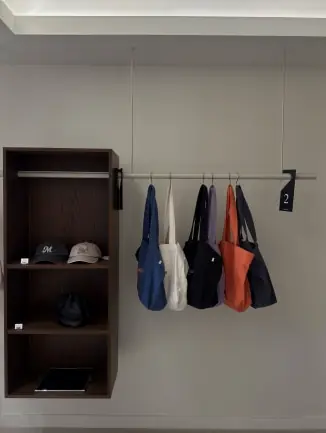 Collection of bags on display shelf