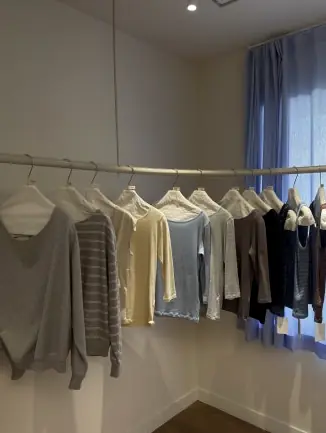 Selection of neutral toned knitwear items