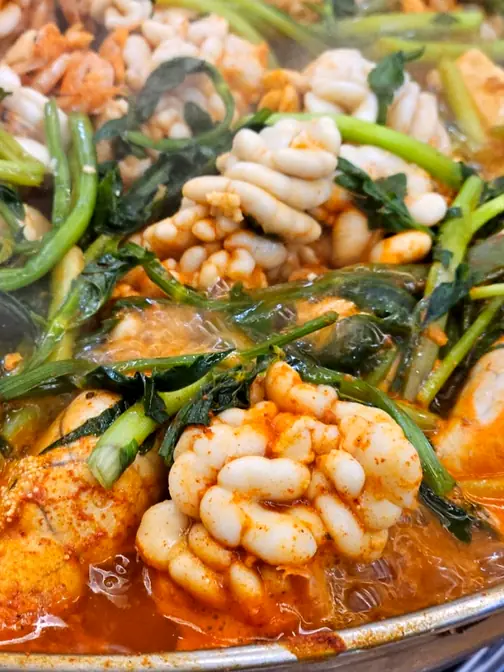 Bubbling codfish stew fish roe