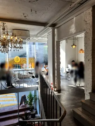 Spacious multi-level cafe interior chandelier