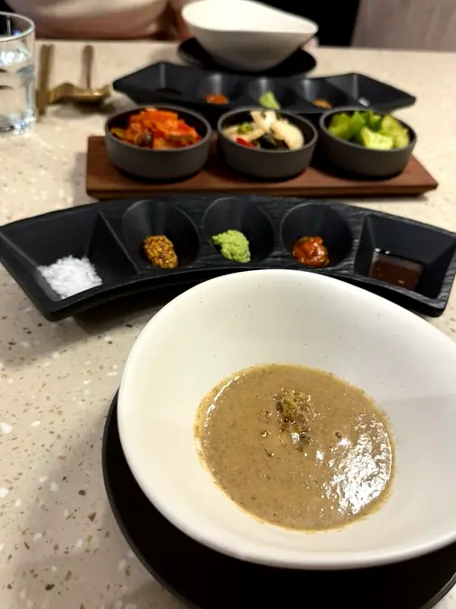 Mushroom porridge served with side dishes