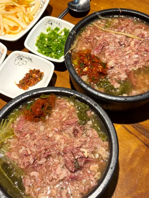 Two bowls of beef soup