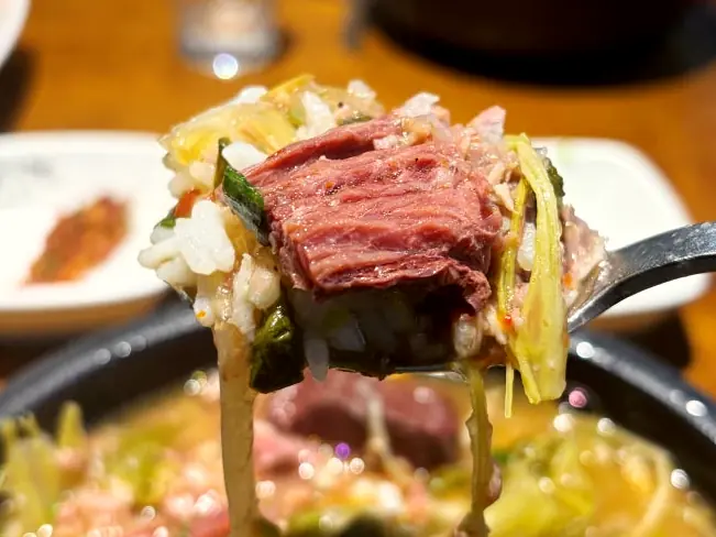 Spoonful of beef and rice