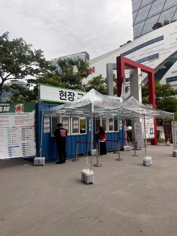 Outdoor festival ticket booth container